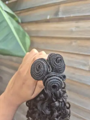 Tissage Funmi curl 7
